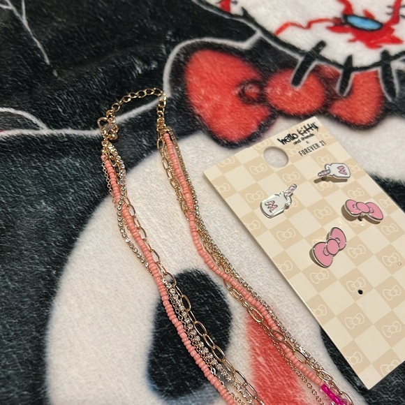 Hello kitty earring set and gold angel/butterfly necklace added! - Picture 5 of 5